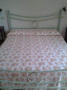 Postel nebo postele na pokoji v ubytování Agriturismo Norianino