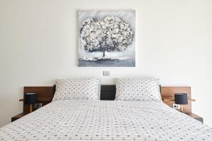 Postel nebo postele na pokoji v ubytování Villa Dolcea