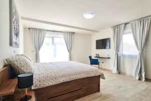 Postel nebo postele na pokoji v ubytování Villa Dolcea