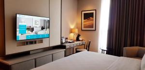 TV a/nebo společenská místnost v ubytování Wyndham Opi Hotel Palembang