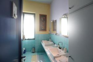 Vonios kambarys apgyvendinimo įstaigoje IL NIDO AL LAGO