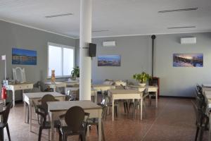 Posezení v ubytování Hotel La Tavernetta