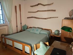 a bedroom with a bed and a table and a table sidx sidx at B&B Villa Ines in Leuca