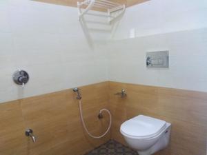 Kylpyhuone majoituspaikassa Wild Window - Forest View Homestay