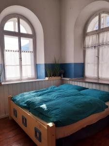 Postel nebo postele na pokoji v ubytování Apartments in Villa Crusca