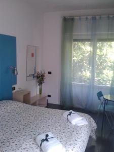 Postel nebo postele na pokoji v ubytování B&B Verdeblu