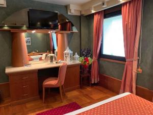 Kuchyň nebo kuchyňský kout v ubytování HR Hotel