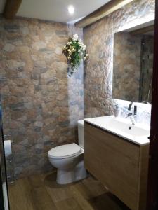 Um banheiro em El Palo Mar