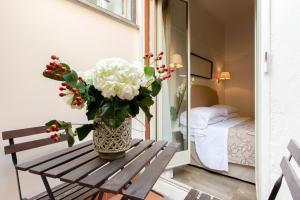 Postel nebo postele na pokoji v ubytování Hotel Modigliani