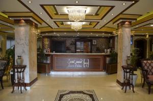 הלובי או אזור הקבלה ב-Amra Palace International Hotel