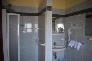 Koupelna v ubytování Hotel Martinez