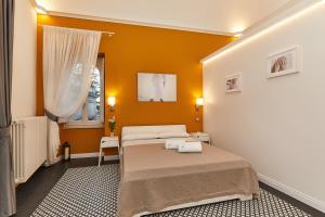 Postel nebo postele na pokoji v ubytování Donna Teresa Guest House