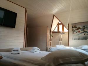 Postel nebo postele na pokoji v ubytování Hotel Galushko