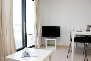 TV/trung tâm giải trí tại Ático Avda del Mar Inmomart