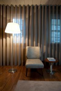 Uma área de estar em Hotel da Oliveira