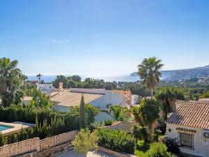 arial view of a villa with palm trees at Holiday Home Zindel by Interhome in Balcon del Mar