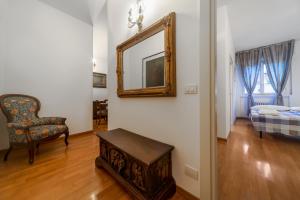 Posteľ alebo postele v izbe v ubytovaní Casa da Suite Classica