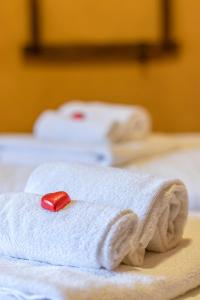 Postel nebo postele na pokoji v ubytování 13 Comuni Ristorante E Albergo