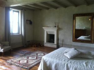 Postel nebo postele na pokoji v ubytování Le Maddalene B&B