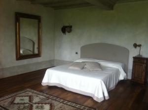 Postel nebo postele na pokoji v ubytování Le Maddalene B&B