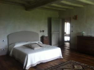 Postel nebo postele na pokoji v ubytování Le Maddalene B&B