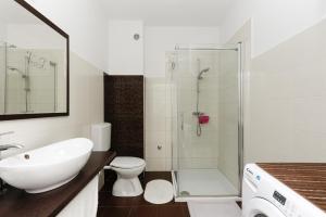 Łazienka w obiekcie Deluxe Apartments Goya