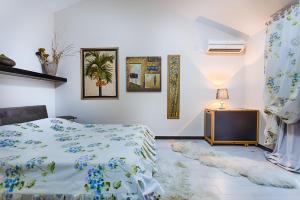 Кровать или кровати в номере Villa Danile Cosy Apartments