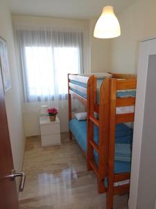 Posteľ alebo postele v izbe v ubytovaní Apartment Marisol L'Ampolla