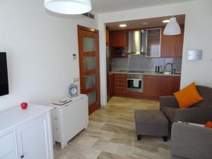 Kuchyňa alebo kuchynka v ubytovaní Apartment Marisol L'Ampolla