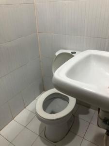 Koupelna v ubytování Edem Tourist Inn Malapascua