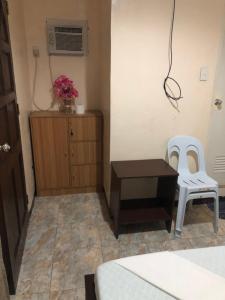 Posezení v ubytování Edem Tourist Inn Malapascua