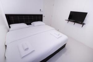 Postel nebo postele na pokoji v ubytování U-need Guesthouse95