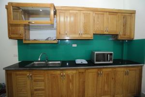 Kuchyň nebo kuchyňský kout v ubytování Ruby Lakeview homestay + 15 fotografií
