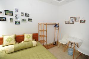 Postel nebo postele na pokoji v ubytování Ruby Lakeview homestay