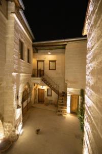 an empty courtyard of a building at night at terracota hotel in Nevşehir