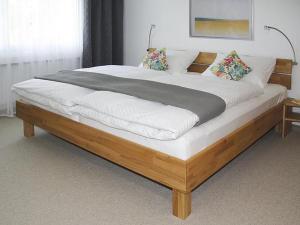 Postel nebo postele na pokoji v ubytování Apartment Piz Mundaun
