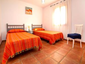 Ein Bett oder Betten in einem Zimmer der Unterkunft Holiday Home Vicent by Interhome