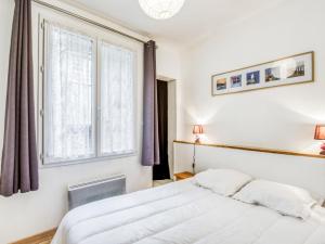 En eller flere senger på et rom på Apartment Asfeld by Interhome