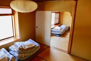 Katil atau katil-katil dalam bilik di FWA Guest House