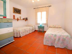 Ein Bett oder Betten in einem Zimmer der Unterkunft Holiday Home Vicent by Interhome