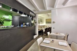 Kuchyň nebo kuchyňský kout v ubytování Urban Hotel Design
