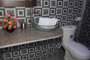 Koupelna v ubytování Hotel Agape