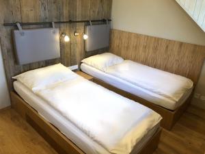 Postel nebo postele na pokoji v ubytování Koliba u Cerneho Medveda