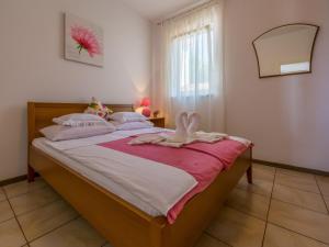 Posteľ alebo postele v izbe v ubytovaní Apartment Slavka