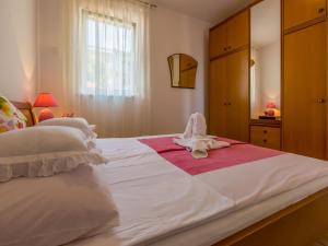 Posteľ alebo postele v izbe v ubytovaní Apartment Slavka