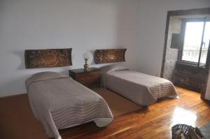 Uma cama ou camas num quarto em Convento de São Francisco