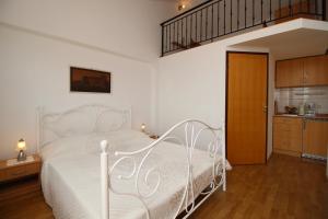 Posteľ alebo postele v izbe v ubytovaní Apartments IVONA 6