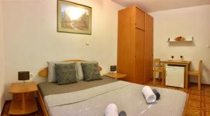 Kuchyň nebo kuchyňský kout v ubytování Apartmani Lisac