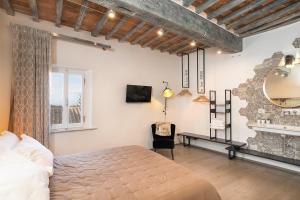 En eller flere senge i et værelse på Milipano Studio Apt