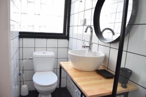 Koupelna v ubytování LEVO Urban Studios